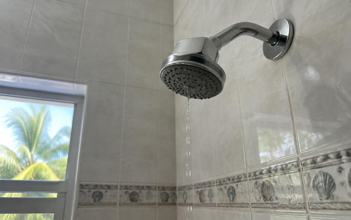 Shower head trickling with very low water pressure